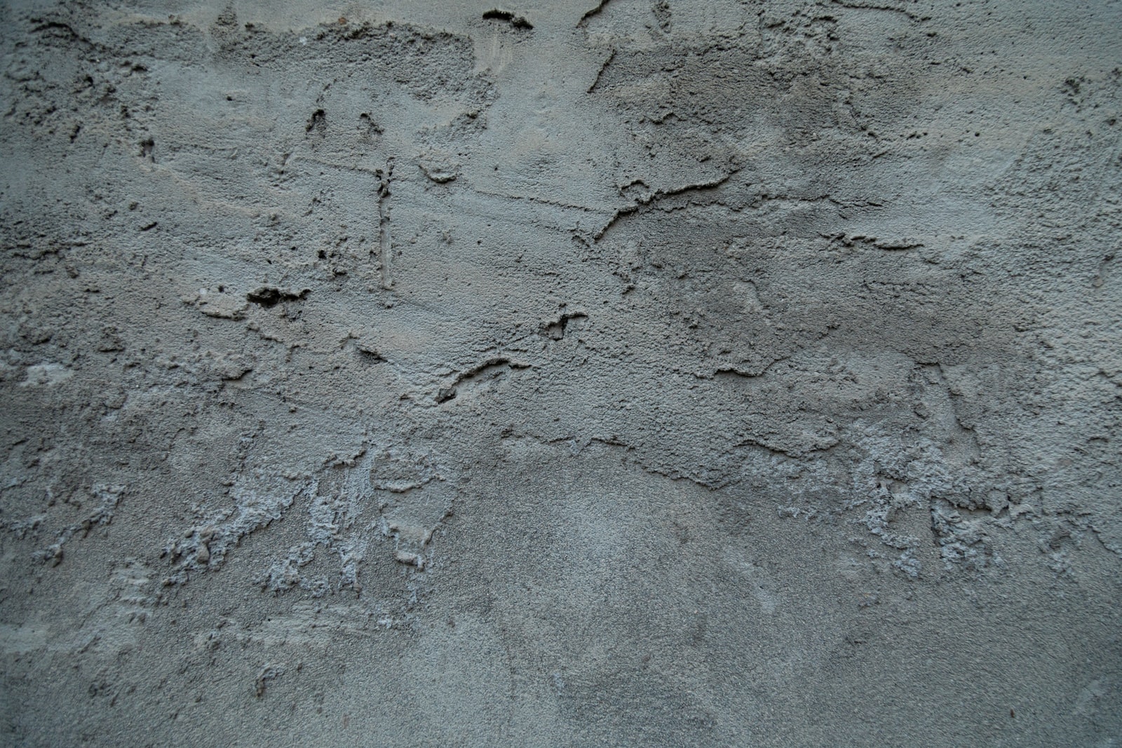Photo d'un enduit sur en mur en beton